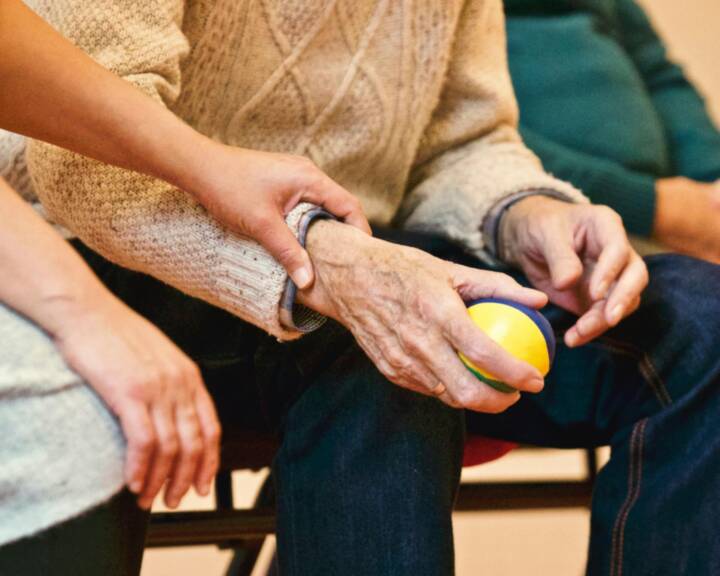 Care professional providing one-to-one support in a person’s home